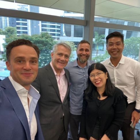 Dwellworks Living CEO Bob Rosing meets with our team working in our Singapore office in 2022.