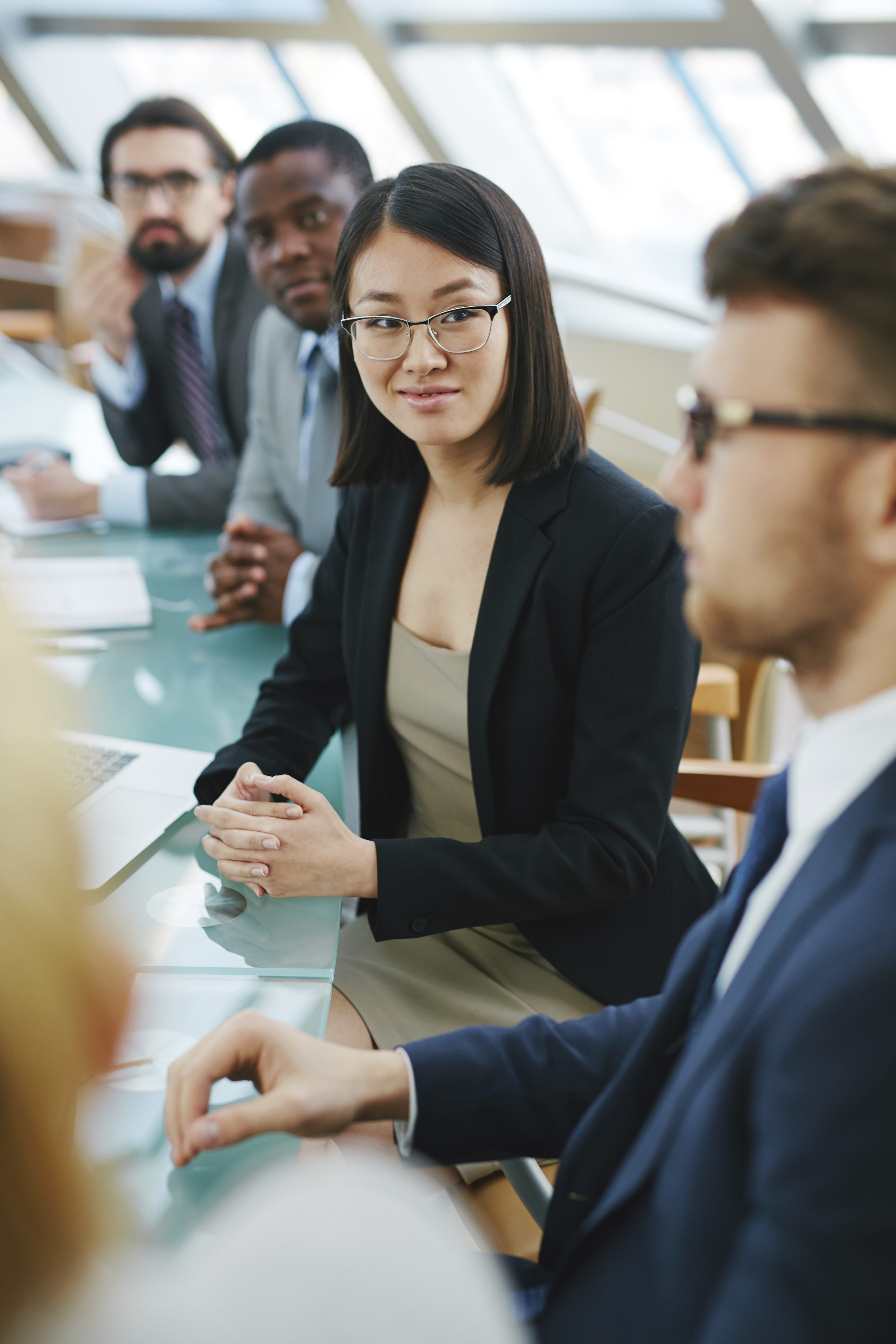 Woman sitting in a board room during a meeting